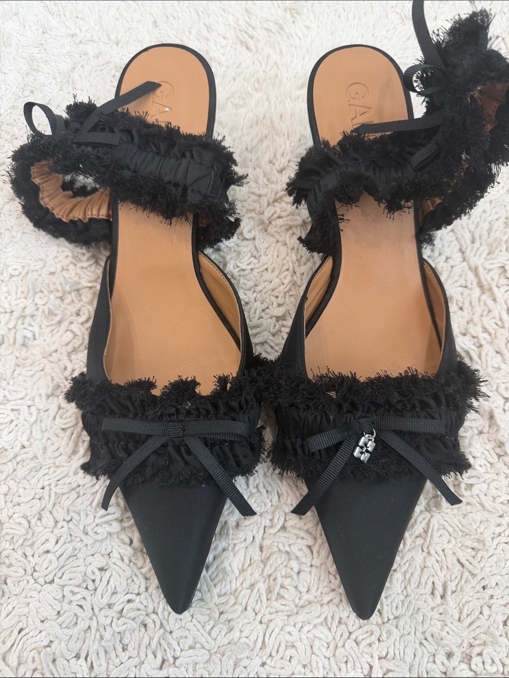 Ganni Black Fringe Pointed-Toe Slingback Heels with Bow
